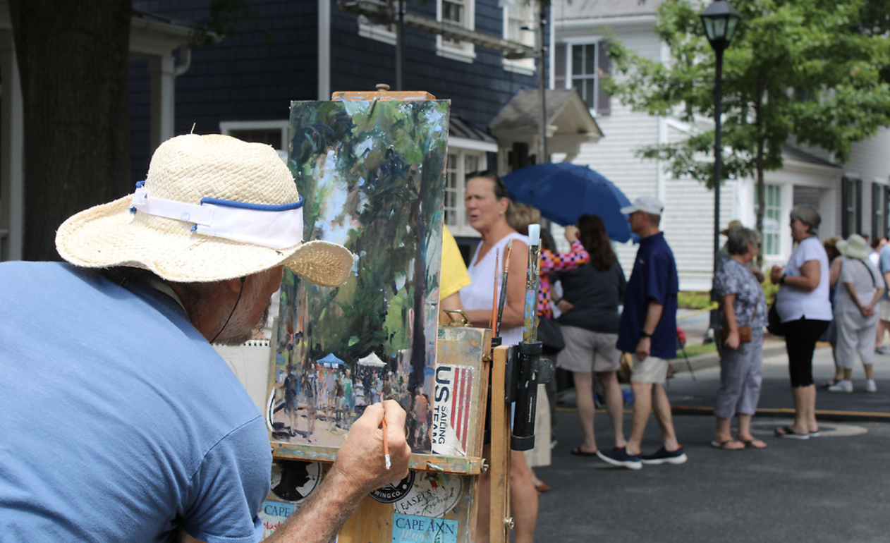 focused shot on artist painting streetscape in Easton Maryland, Plein Air Easton Artist Festival
